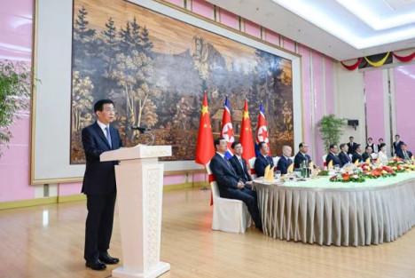 王沪宁出席《中朝友好合作互助条约》签订65周年纪念招待会