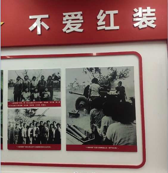 七绝·为女民兵题照